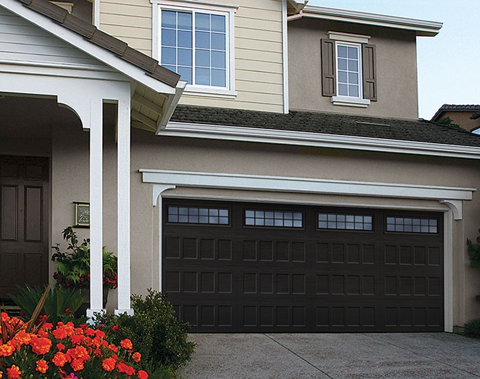 Stamped steel garage door