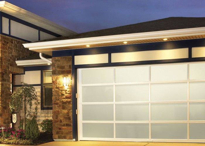 Modern home with aluminum garage door.