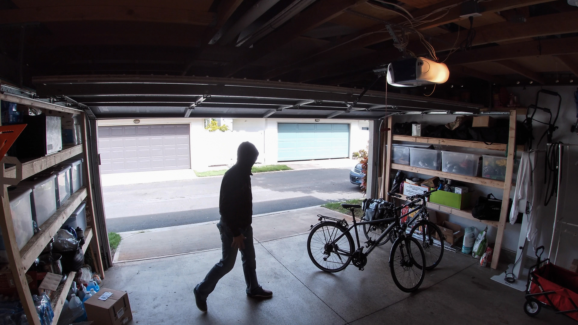 Thief breaking into garage