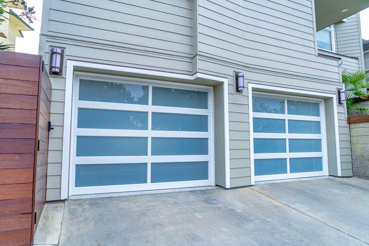 Picture of a modern glass and aluminum garage door.