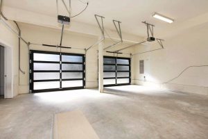 inside of garage with well maintained fiber glass panel doors. regular maintenance
